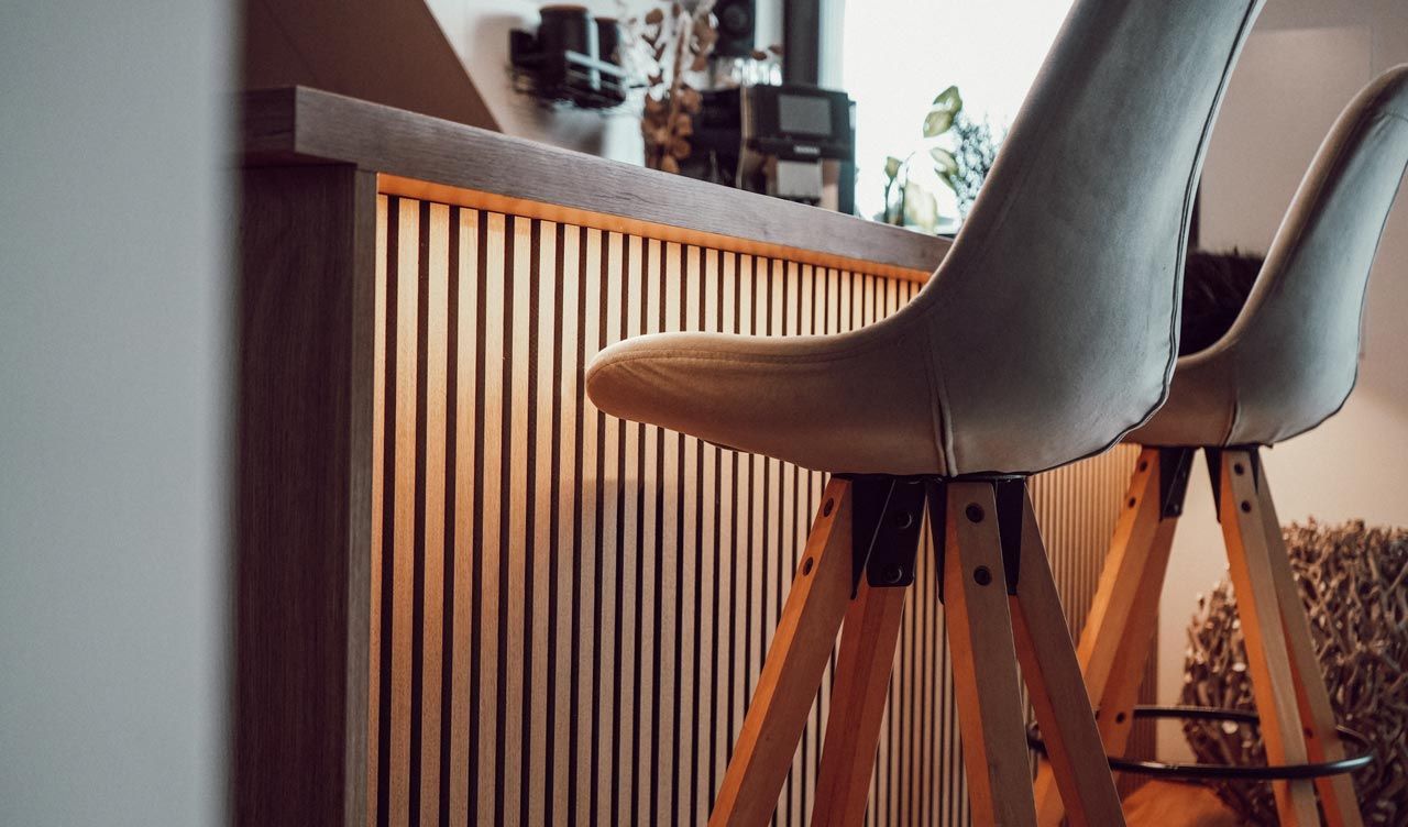 Houten akoestische panelen brengen rust en sfeer in huis of kantoor