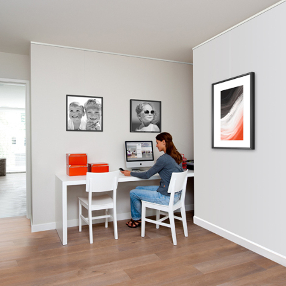 Fotokaders of schilderijen ophangen zonder de muur te beschadigen